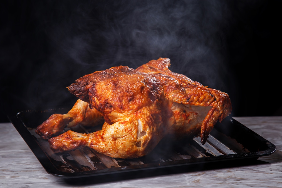 Baked chicken steaming hot from the oven