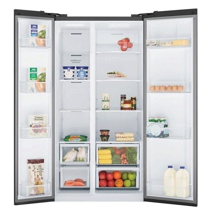 Stocked side-by-side refrigerator interior with produce and dairy