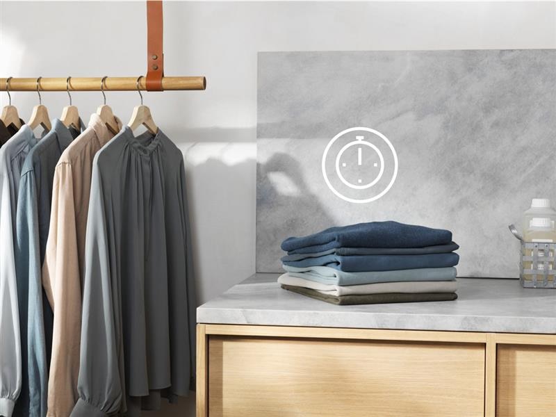 Freshly folded clothes next to hanged clothes with a timing icon